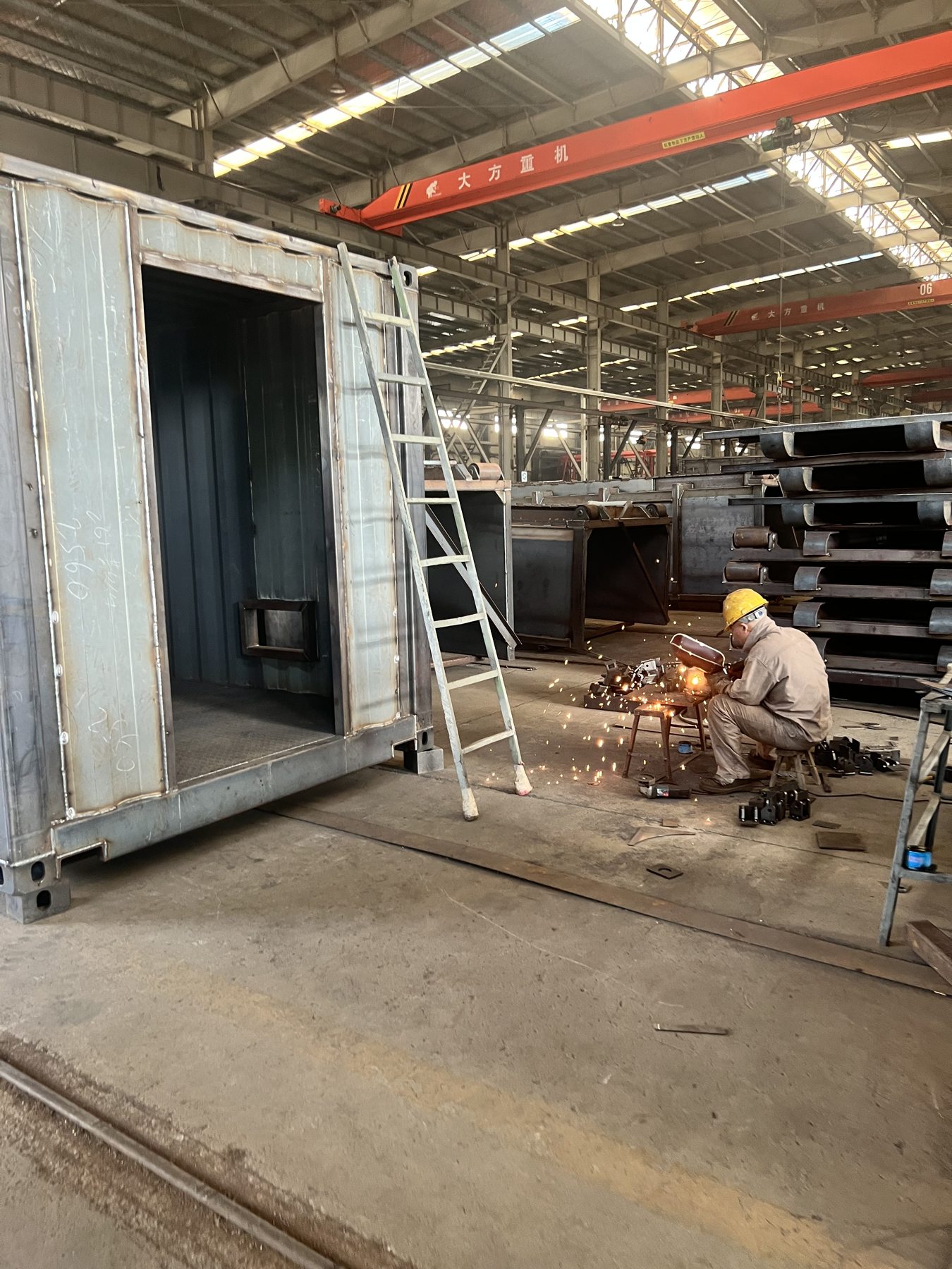 Modular steel structure being assembled at a partner factory