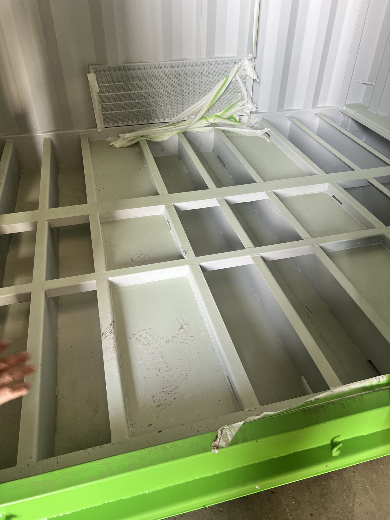 Fabricated steel base and internal structural compartments
